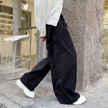 2022 tavaszi koreai stílus Személyre szabott Fodros design széles láb nadrág férfi alkalmi laza fekete széles láb nadrág férfi nadrág